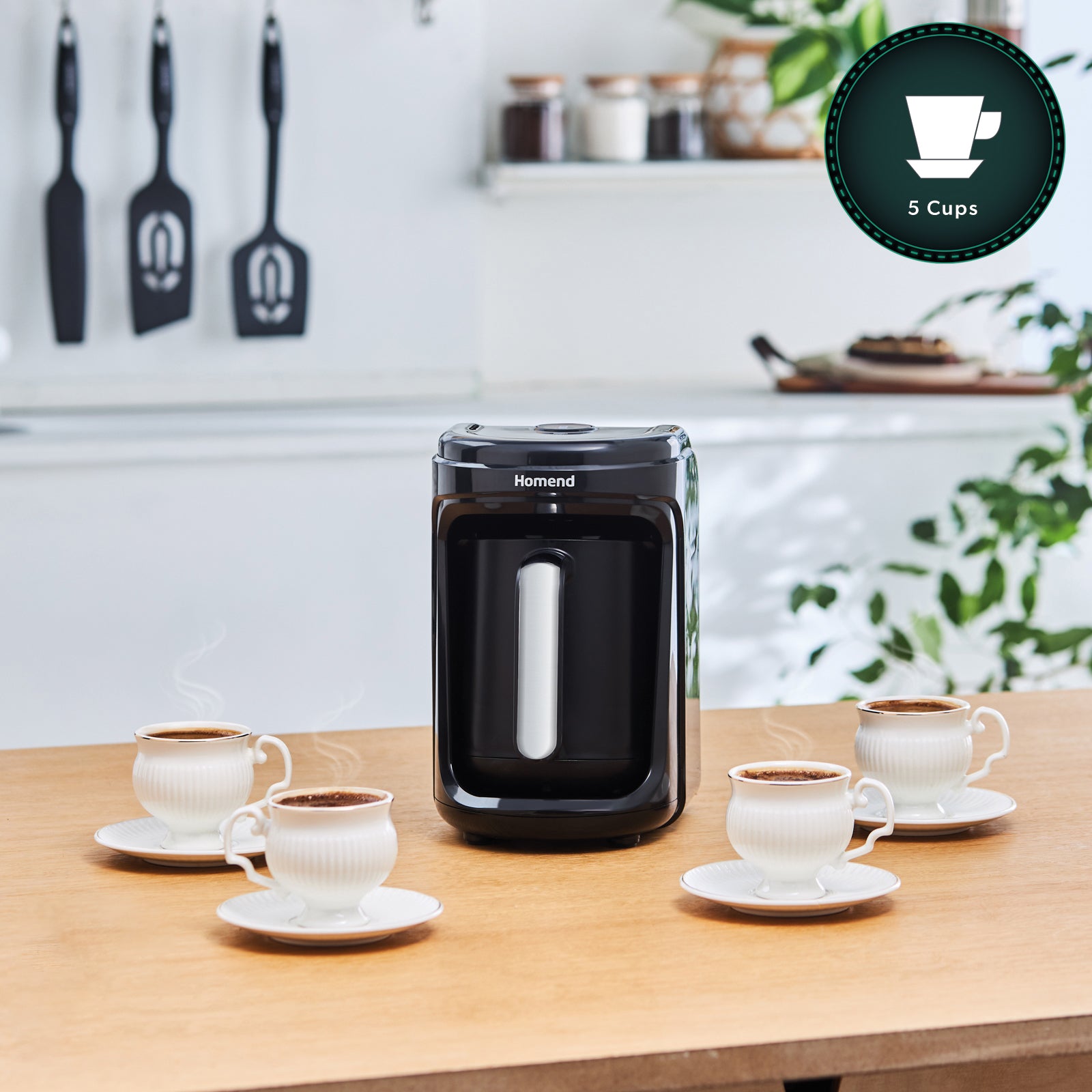 the coffee machine has large capacity to cook up to 5 coffees espresso size. Turkish coffee, greek coffee machine on the counter with 5 freshly cooked coffees with the visible steam on the cups.