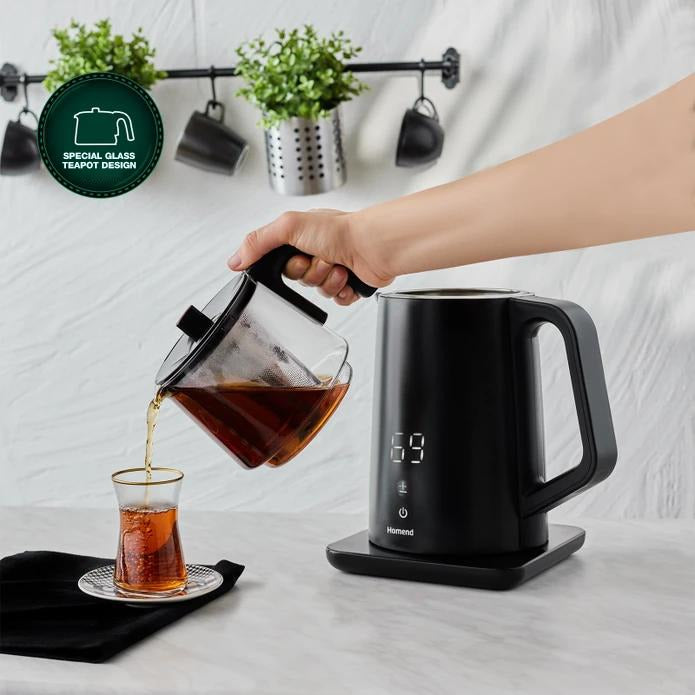 Specially designed easy to pour shiny durable see through glass teapot. The bright color of the tea is visible and creates a modern look. A. person pouring tea to teaglass from teapot that is been promoted as tea maker.